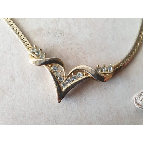 91 - Decorative Gold Tone Necklace Set with Clear Stones, Together with Pair of Earrings and White Metal ... 