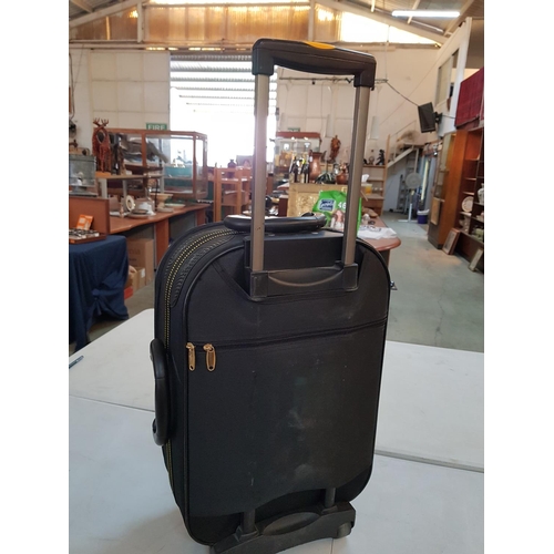 396 - Travel Set, Large Black Suitcase and Cabin Suitcase Both on Wheels and with Pull - Out Handle (A/F)