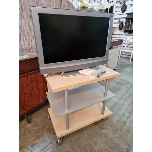 733 - Sony Bravia 32'' TV, (Model: KDL-32U2000) with Manual and Remote, Together with 3-Tier Light Wood an... 