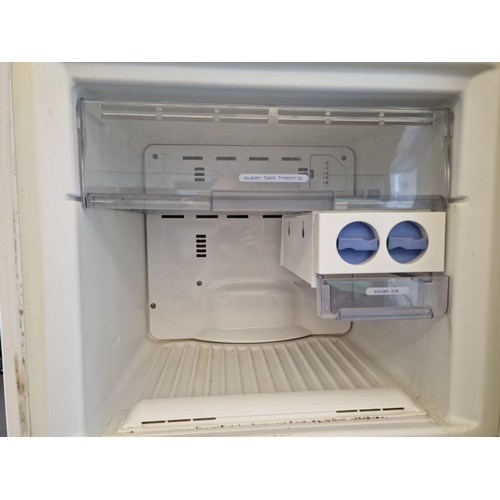 765 - Whirlpool Fridge Freezer, White Colour, Model: ARC4110), (Approx. 60 x 64 x 187cm)