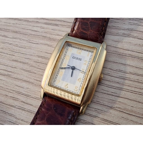 663 - Guess Gold Tone Ladies Wrist Watch with Brown Leather Strap, * Working when Lotted *