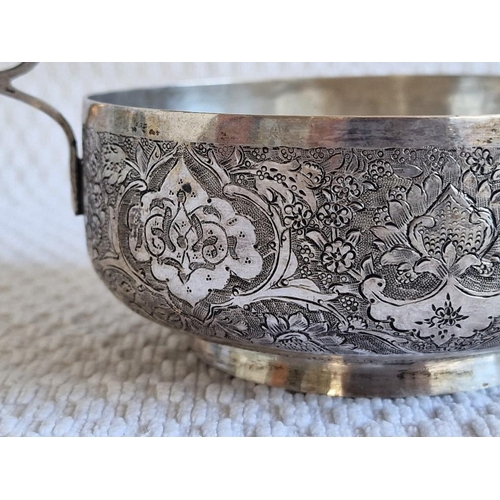 104 - Persian Silver Twin Handled Bowl, with Decorative Floral Pattern (Approx. Ø: 10.5cm, 184g)