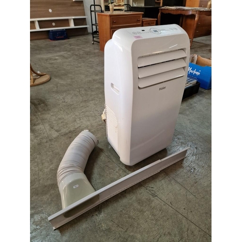 272 - Haier Portable Air Conditioner, Model AM12AA1GAA, with Extraction Pipe and Door / Window Strip