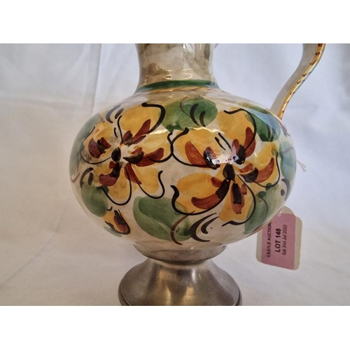 148 - Decorative Porcelain Jug with Floral Pattern and White Metal Base and Lid, (Approx. H: 26cm)