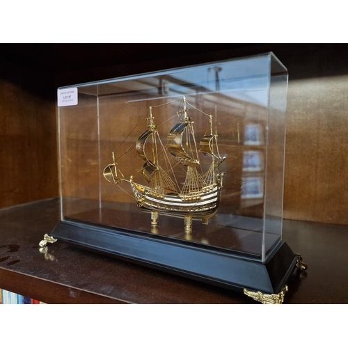 97 - Gold Plated Model of Sailing Ship on Base in Plastic Display Case, (Approx. 31 x 12 x 21cm)