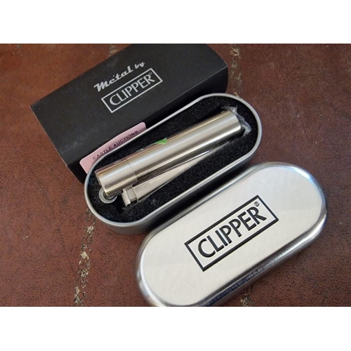 79 - Small Collection of Lighters; 'Clipper' in Tin, 'Picoflam' in Soft Case and 2 Others (4)