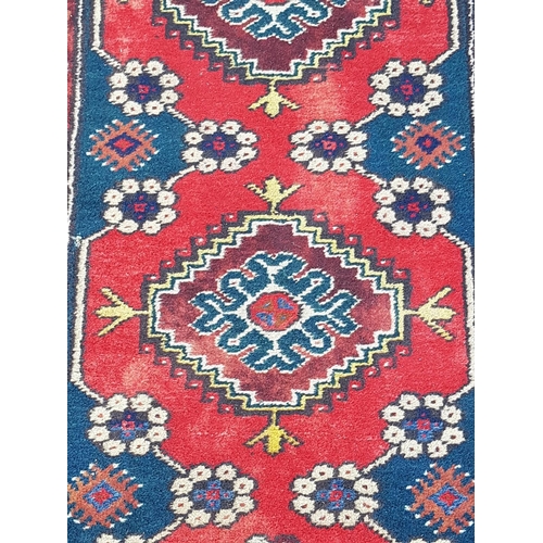 546 - Red / Blue / Brown Wool Rug in Geometric Pattern (310 x 75cm)