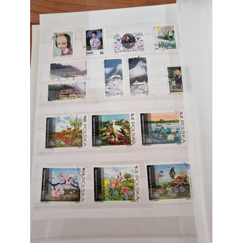 211 - 24-Page Album with Qty of Assorted World Stamps