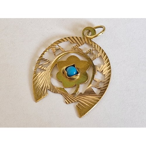 62 - 9ct Gold Pendant with Decorative Horseshoe Shape, Set with Blue Stone (