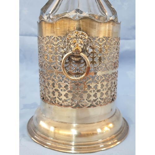 145 - Vintage Cut Glass Decanter in White Metal Holder Decorated with Lion's Head (H:33cm)