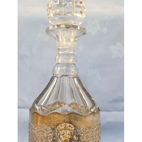 145 - Vintage Cut Glass Decanter in White Metal Holder Decorated with Lion's Head (H:33cm)