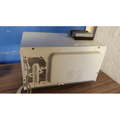 96 - Microwave Neff White Integrated (38cm) *Working when Lotted*