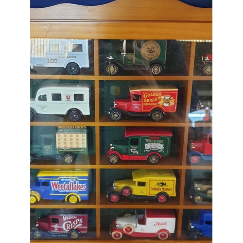 75 - Glazed Display Cabinet Containing 15 Lledo Die Cast Commercial Vehicles