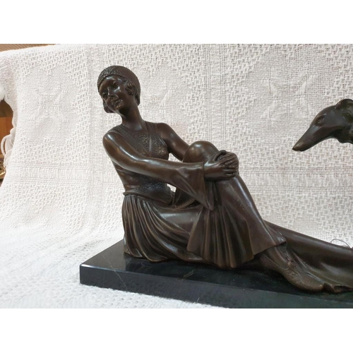 676L - A Fine Art Deco Bronze Sculpture of Seated Lady with Dog, Circa 1930 on Black Marble Base (60cm x 17... 