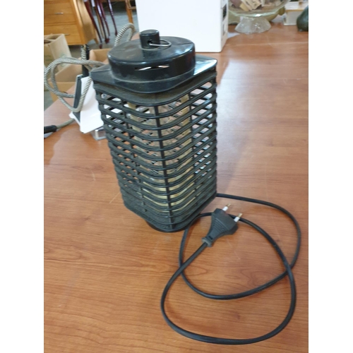 677 - Home Electric Tools inc; The Wall Outlet Portable Heater, Insect Killer and 