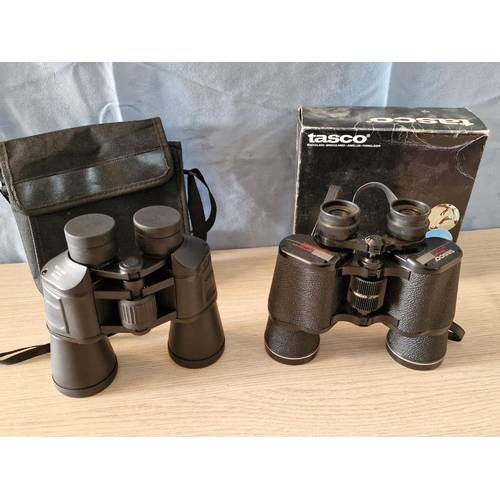 64 - 2 x Pairs of Binoculars; Tasco 12x50mm with Box and Other 10x50mm with Case (2)