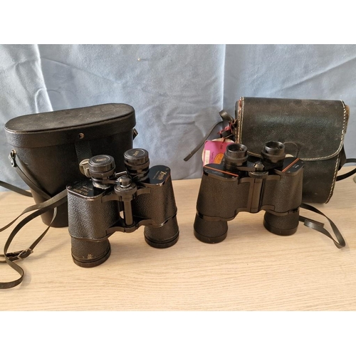 65 - 2 x Pairs of Binoculars; Prinz 10x50mm with Case and Zenith Tempest 10x50mm in Case, (2)