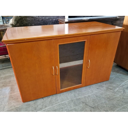 207 - Cherry Colour Wood Effect Sideboard with Bi-Fold Part Glazed Door, (Approx. 136 x 61 x 81cm)