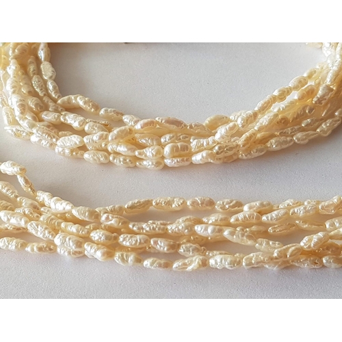 7 - Seed Pearl Multi Strand Necklace (L:46cm) and Matching Bracelet (L:21cm)