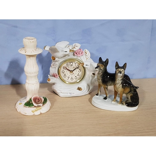 82 - 3 x Porcelain Items; Dog Ornament, Clock with Birds and Candlestick, (3)