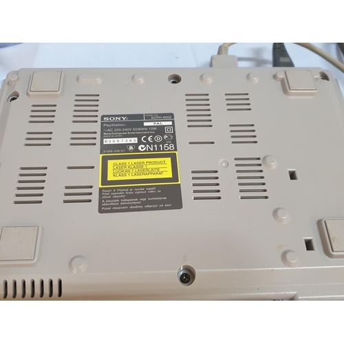 181 - Console Playstation 1 with 1 x Controller and Games