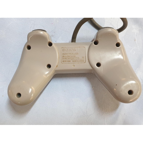 181 - Console Playstation 1 with 1 x Controller and Games