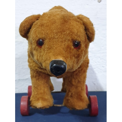 10 - Vintage Toy Bear on Red Wooden Wheels