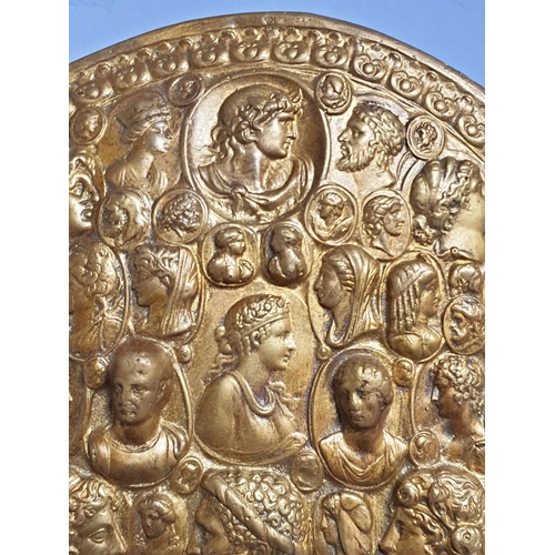 312 - Small Oval Brass Relief Decorated with Many Faces / Portraits (23.5cm x 20cm)