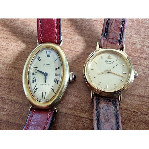 118 - 2 x Ladies Gold Tone Wrist Watches; Avia Incabloc 17 Jewells and Seiko 1N01-OE20, (2), Nb. Untested.