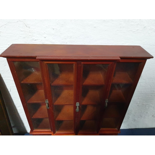 275 - 2 x Similar Small Display Cabinets (47 x 37 x 7.5cm each) Wood / Plastic Front Door (A/F)