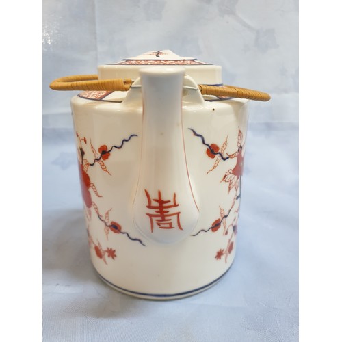 123 - Vintage Style China Porcelain Tea Pot with Woven Travel Basket