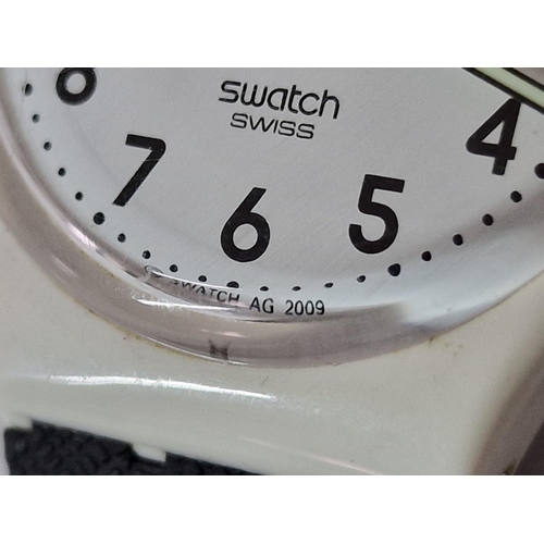 123 - Swatch Wrist Watch, AG2009, White Colour Case & Face on Black Rubber Strap, Quartz, Running When Lot... 