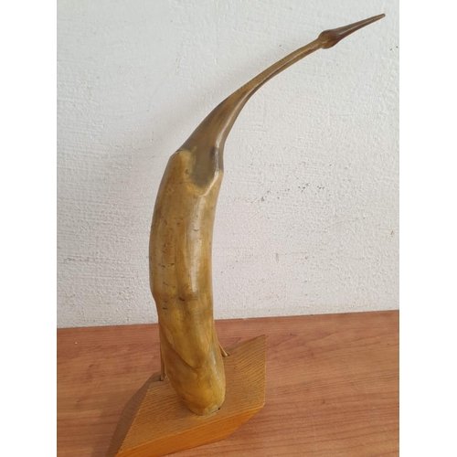 28 - Carved Horn in the Shape of Bird, on Wooden Base H: 35cm (A/F)