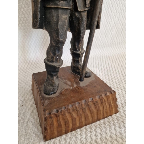 31 - Metal Statue of Male Figure with Axe and Lantern on Wooden Base, (Approx. H: 42cm)