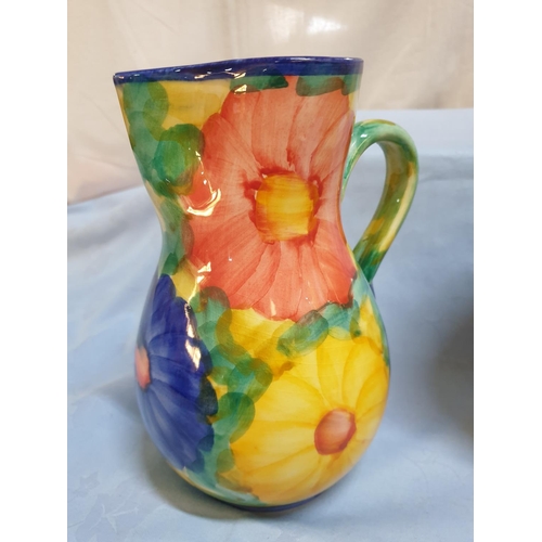 588 - Funky Cutlery with Sunny Yellow Handles and Ceramic Floral Pattern Jug (H:20cm)