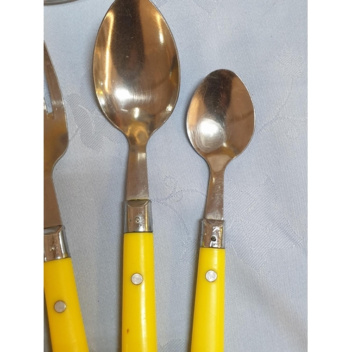 588 - Funky Cutlery with Sunny Yellow Handles and Ceramic Floral Pattern Jug (H:20cm)