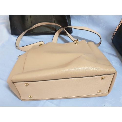 627 - 2 x Black and Beige Ladies Handbags