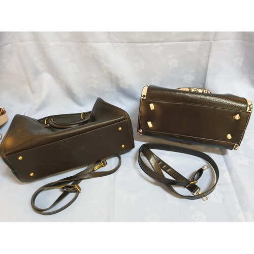 627 - 2 x Black and Beige Ladies Handbags