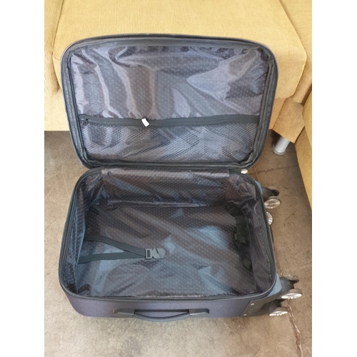 637 - Black and Navy Blue Small Suitcases on Wheels and with Removable Handle (A/F)