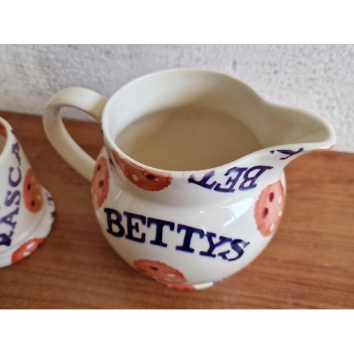 132 - Emma Bridgwater's 'Betty's Fat Rascal' Jug (H: 14cm), and Mug, (H: 10cm), (2)