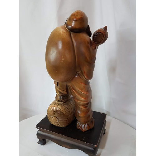 803 - Austin Home Collection Sculpture of an Asian Make Seller on Wooden Base (Sculpture 33.5 x 13.5cm and... 