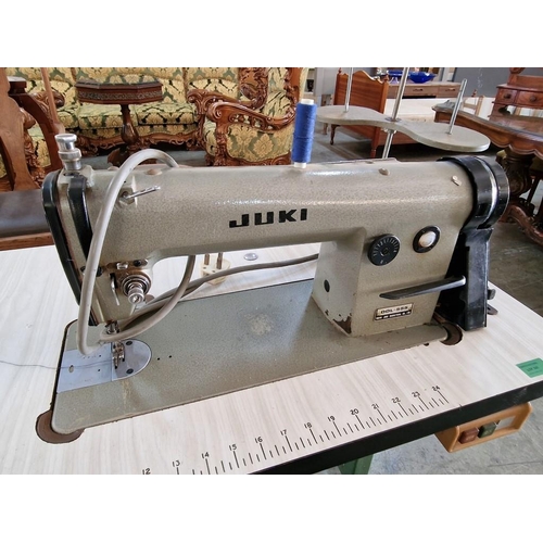 321 - Juki DDL-555 Industrial Sewing Machine on Table with Foot Pedal