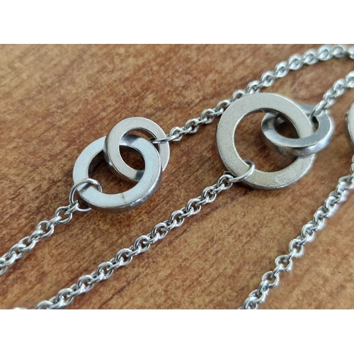 209 - Silver Triple Strand Bracelet with Chain & Rings, and Small 18ct Gold Disc Engraved 'M',  (Approx. L... 