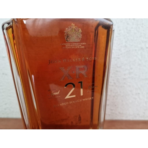 9 - John Walker & Sons, 21 Year XR Blended Scotch Whisky, 750ml, 40%, in Original Gold Tone Presentation... 