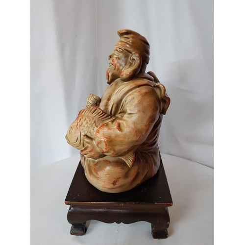 811 - Austin Home Collection of Sculpture of Asian Man with Fish on Wooden Base (Sculpture 23 x 19cm & Bas... 