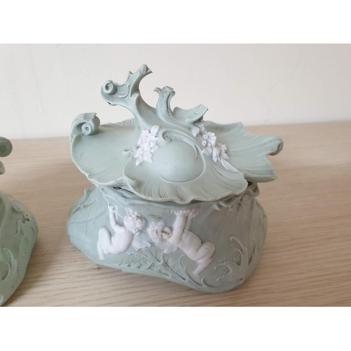 171 - A Pair of Rare Pale Green Rococo Baluster Bowls and Covers, Applied with White Cherubs (1 x Lid with... 