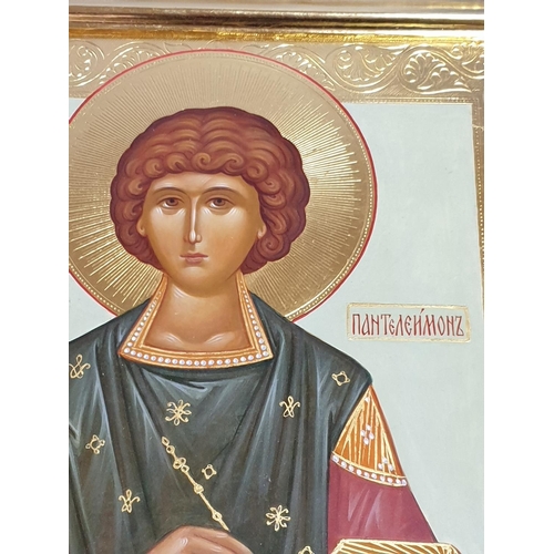 180 - Saint Panteleimon Hand Painted Icon in Gilded Frame and Wooden Box with Glass Door