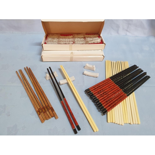 345 - 19 x Pair of Chopsticks Together with 2 x Sets of Porcelain Cutlery Sets (12pcs each)