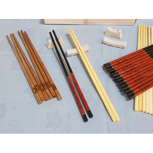 345 - 19 x Pair of Chopsticks Together with 2 x Sets of Porcelain Cutlery Sets (12pcs each)