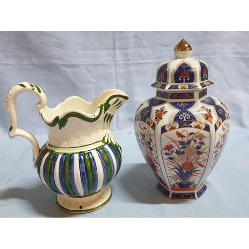 472 - A Varied Collection of Jugs and Urns including 